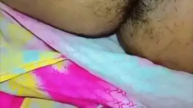 Bhabhi in glasses goes naked and fingers cunt