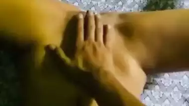 The guy fingers his GF’s tight desi pussy in the 69 position