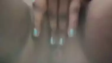 Village girl strips clothes and fingers her pussy heavily