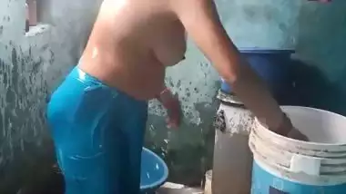 Mature aunty topless bathing caught on camera