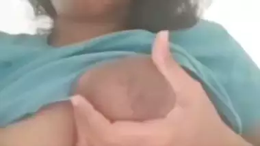 Cute facial expression showing bhabhi topless selfie